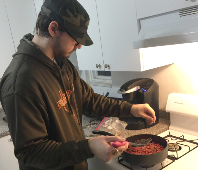 Participant  assisting in meal prep